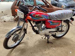 all okay bike red colour bike 2023 model Karachi number