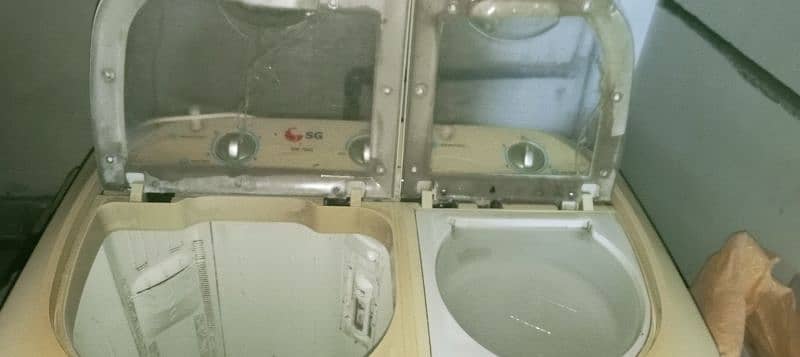 sg washing machine neat and clean condition both side working perfect 1