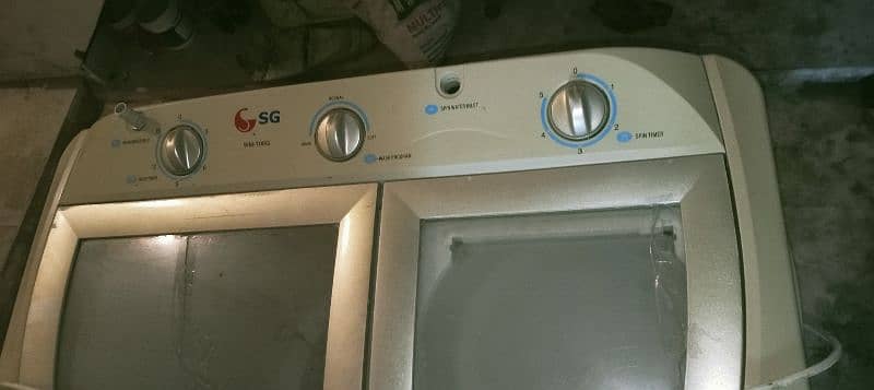 sg washing machine neat and clean condition both side working perfect 8