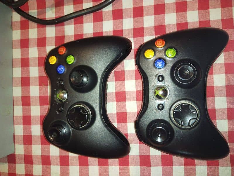 Xbox 360 500 gb two original wireless controllers 100 plus games 4