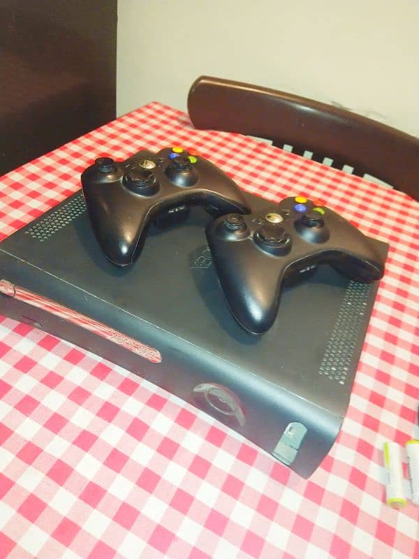 Xbox 360 500 gb two original wireless controllers 100 plus games 8