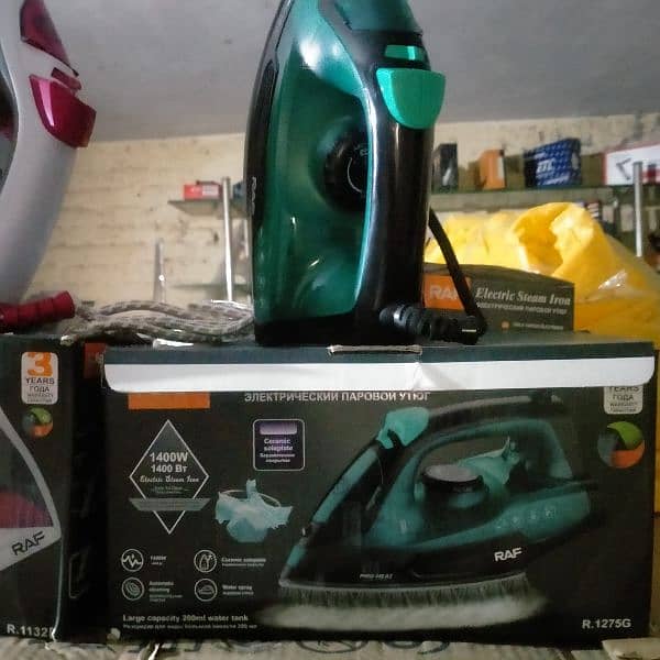 RAF BRAND STEAM IRON MADE CHINA'S 4