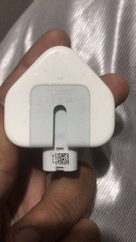 Mac book charger، delivery available 1