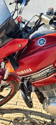 yamaha ybr125 red/exchange possible with honda 125 self start 22 model