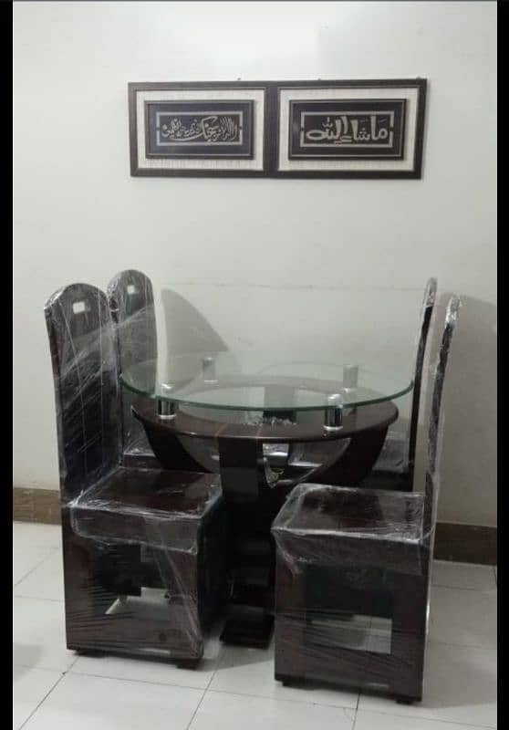 brand new dining table with 4 chairs. untouch 4