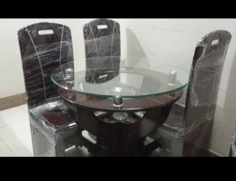 brand new dining table with 4 chairs. untouch 9