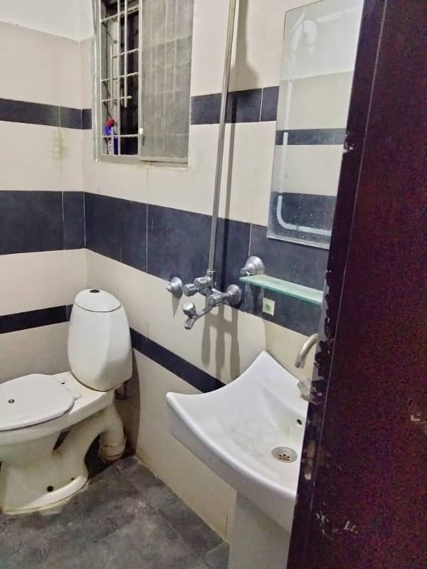 Upper portion for rent 2bad attach TV launch kitchen bathroom marble flooring woodwork good location man apruch 9