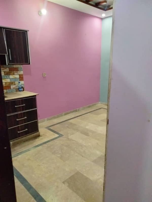 Upper portion for rent 2bad attach TV launch kitchen bathroom marble flooring woodwork good location man apruch 13