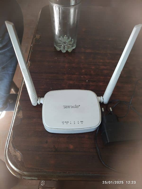 tenda router or  70 80  feet tar hai bilkul. ok hai 2