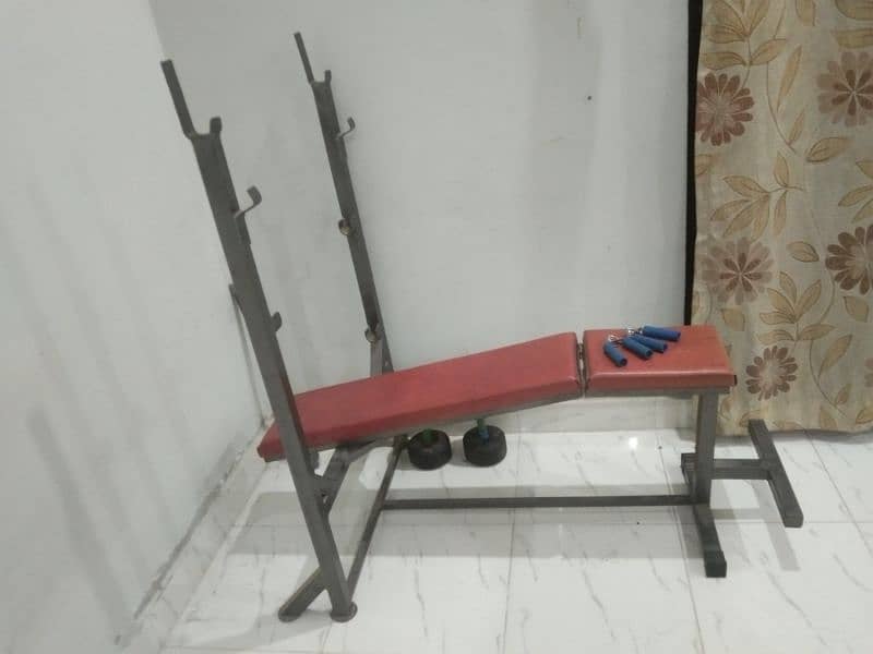 gym bench, dumbles and hand grippers 1