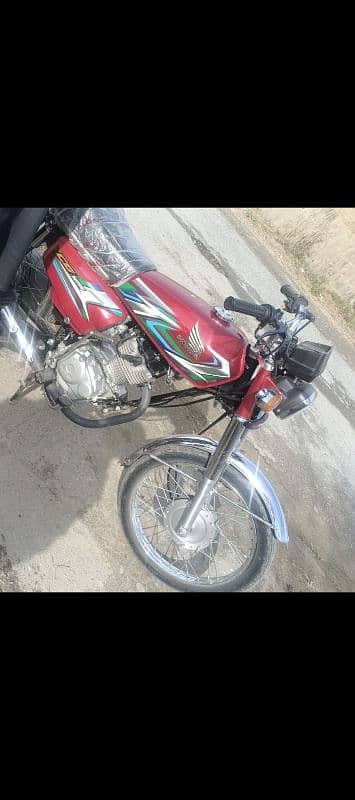 Honda 125 number Islamabad all ok 4