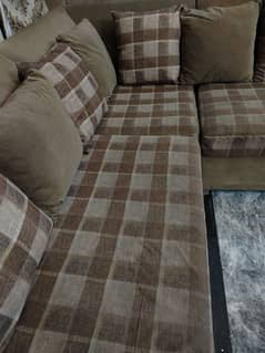 brown sofas with cushions