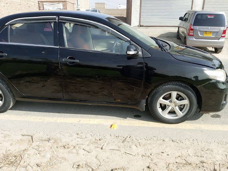 Black Toyota Corolla XLI 2013 2