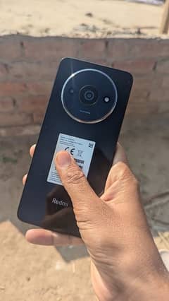 Redmi A3 with box and charger