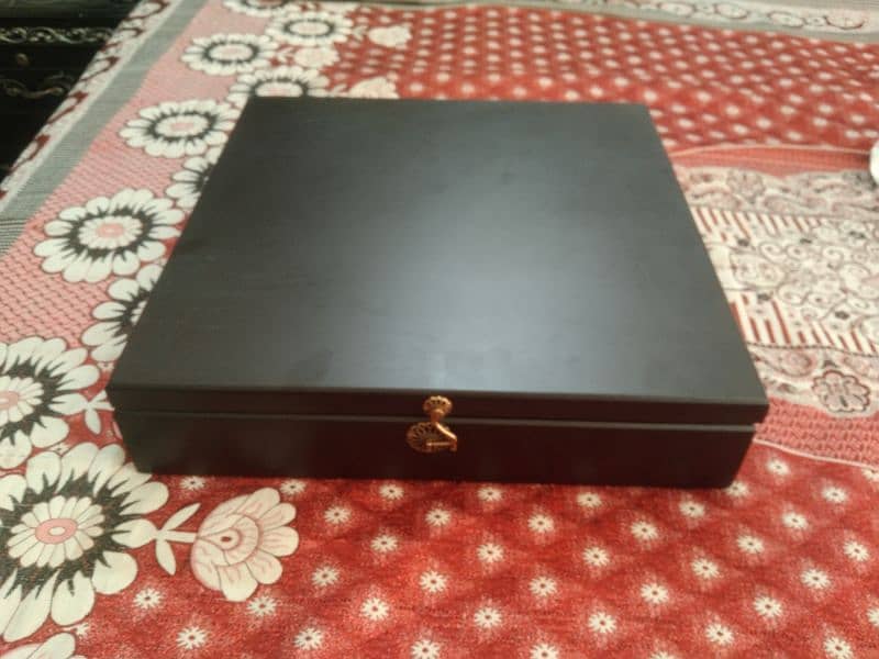 jewelery box . . . . wooden and very decent and a heavy wooden weight 2