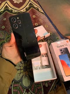 redmi 12 8/128 box chrger sath condition 10/9 family use