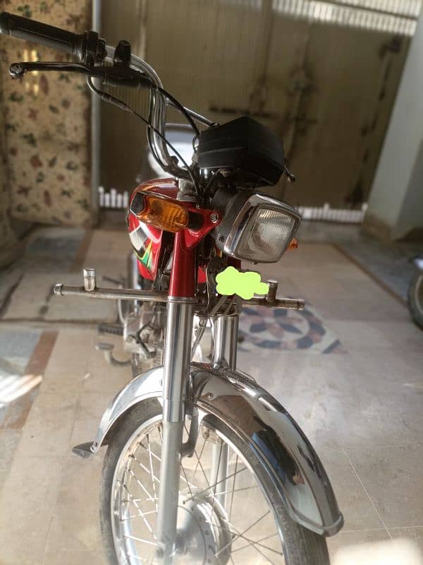 Honda 70cc all documents clear and free halmet 1