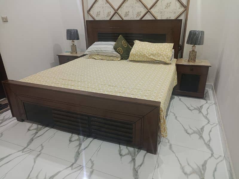 King size bed along with side tables 0