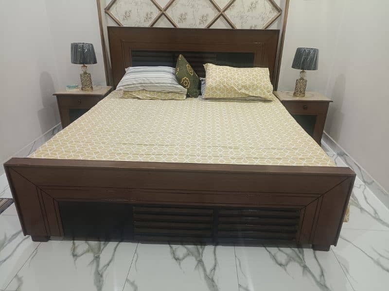 King size bed along with side tables 1