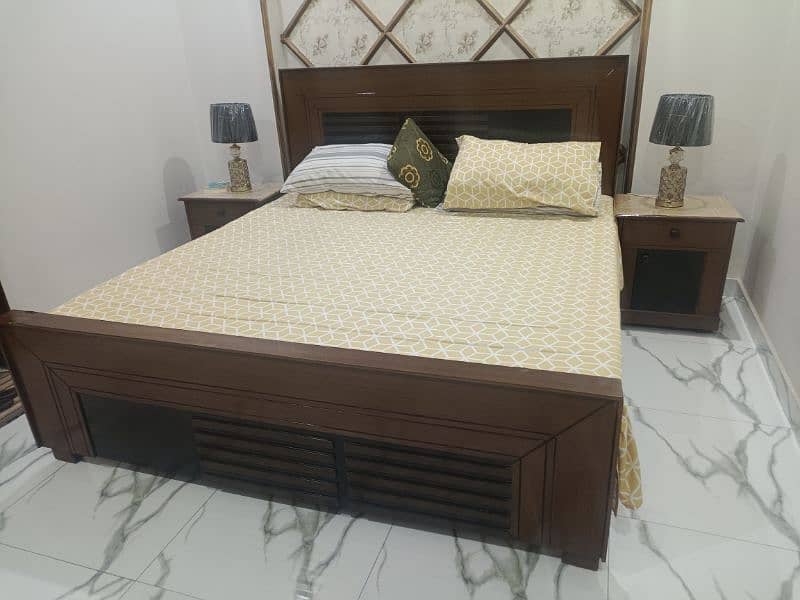 King size bed along with side tables 2