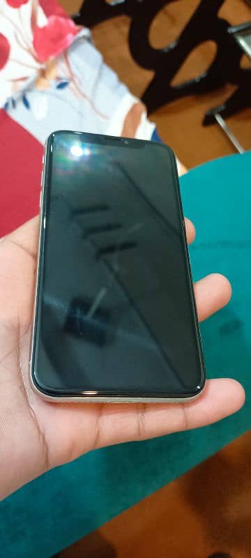 I phone x 256 gb non pta just bettry change baqi All ok hy 2