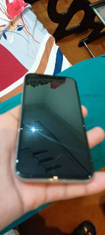 I phone x 256 gb non pta just bettry change baqi All ok hy 6