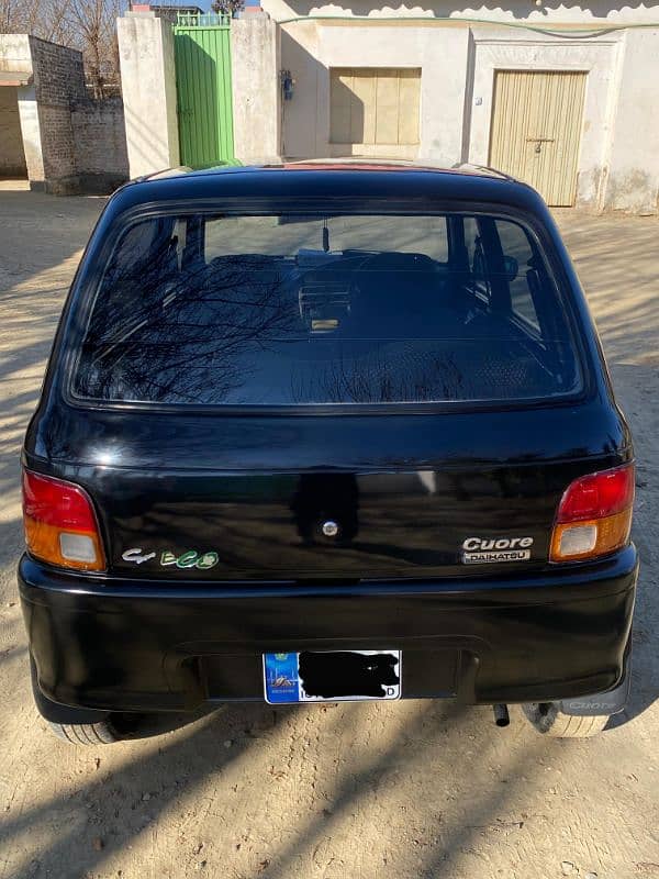 Daihatsu Cuore 2001 4