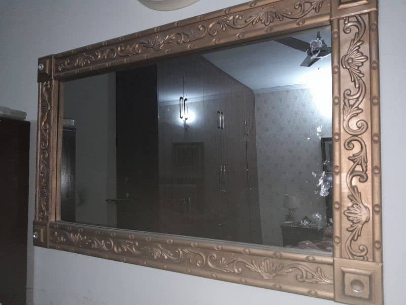 Carved mirror 0