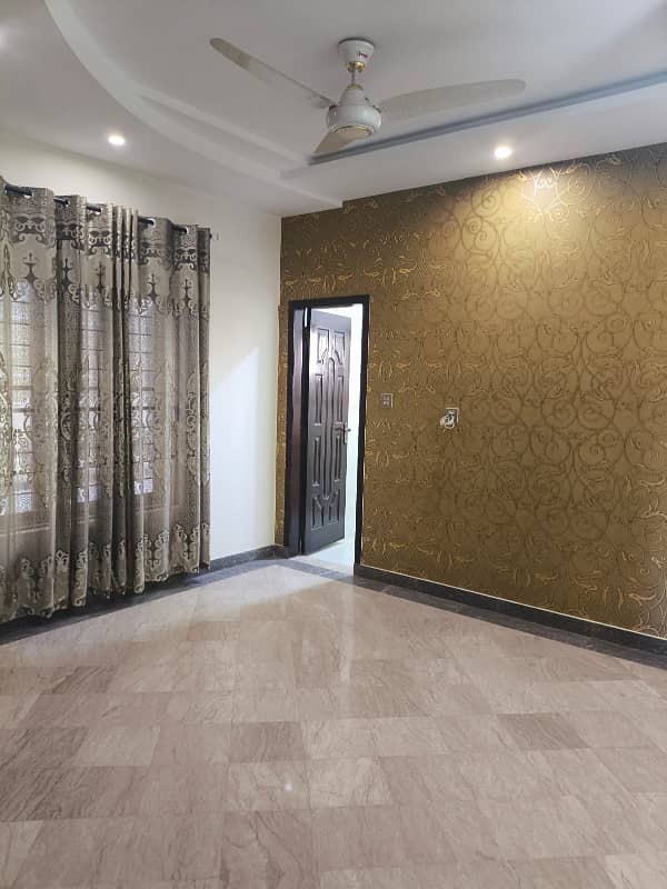 8 Marla House For Sale In Usman Block Bahria Town Lahore. 1