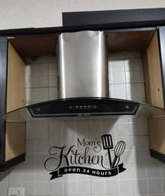 cooking range along with hood