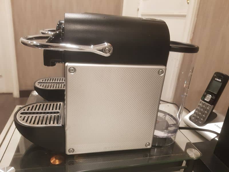 Nespresso Pixie Coffee Brewing Machine. 1