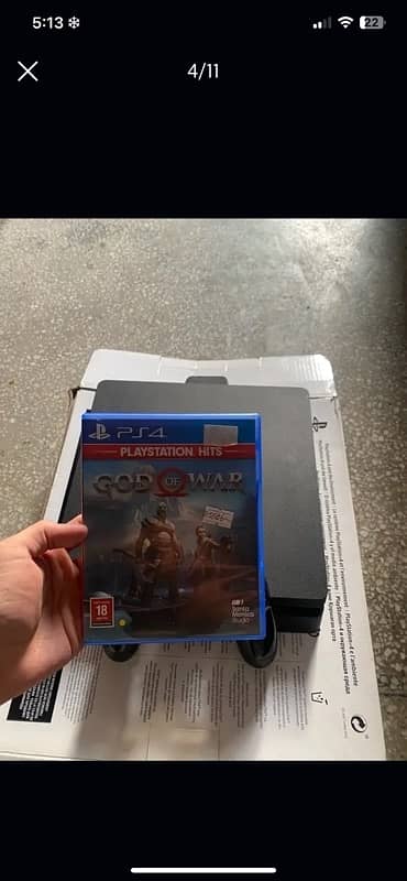 PS4 Slim w original controller and  God of war 4 game 1