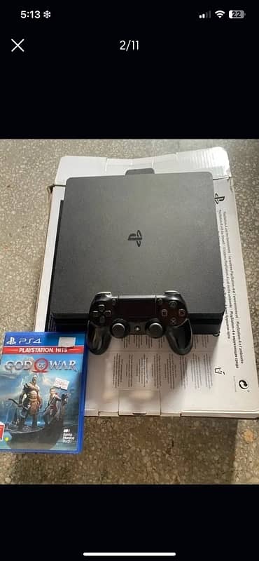 PS4 Slim w original controller and  God of war 4 game 2