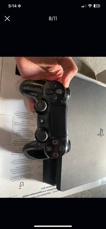 PS4 Slim w original controller and  God of war 4 game 6