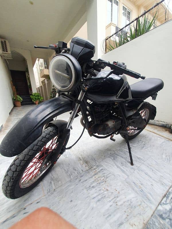 suzuki gs150 turned afzercustoms tracker 5