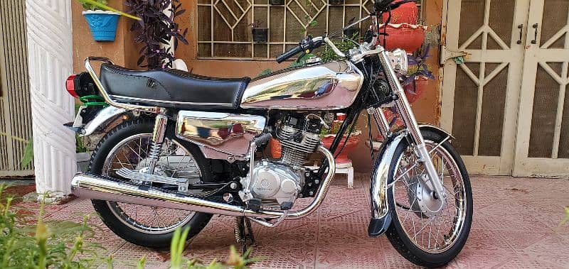 honda 125 islamabad number 0