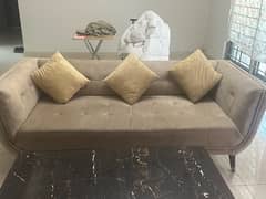 3 seater golden fawn sofa barely used with 3 cushions