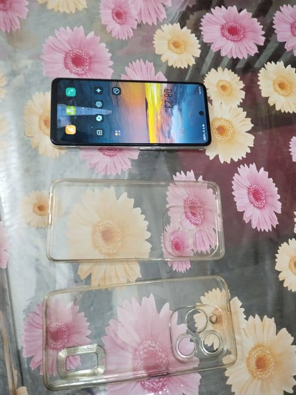 Infinix hot 40 i with box + 2 back cover 3