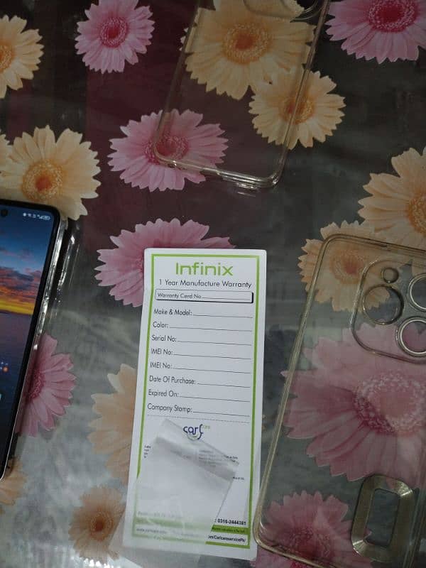 Infinix hot 40 i with box + 2 back cover 4