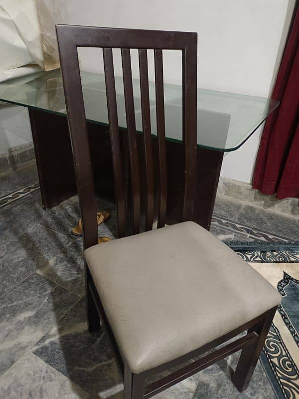 Dining table with 6 chairs available 1