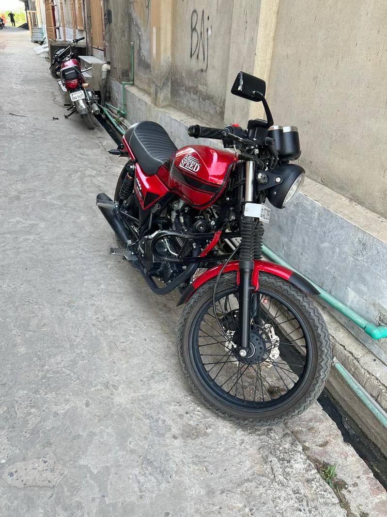 Hi speed Red color bike. 1