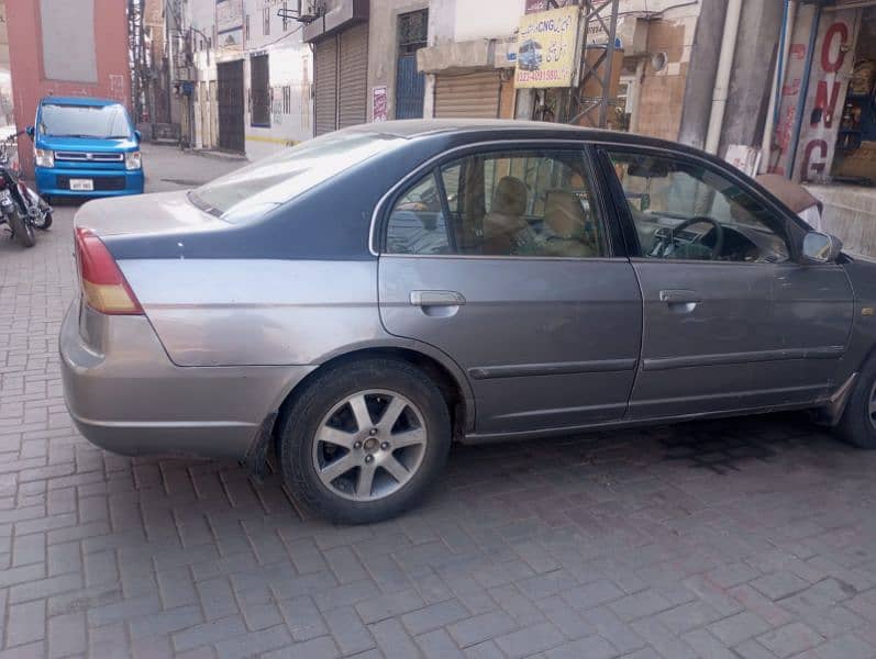 Honda Civic Oriel 2004 2