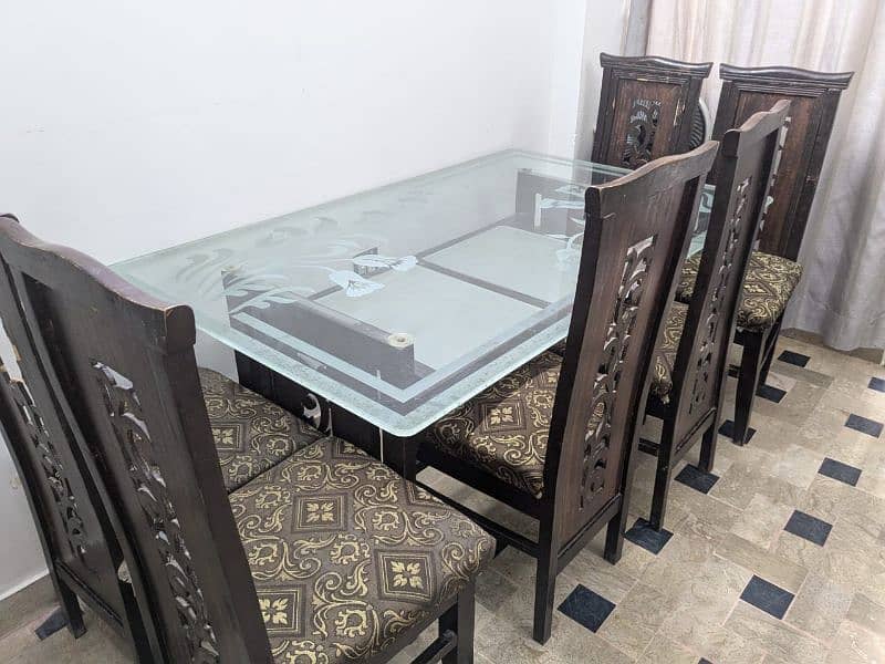 6 seater Wooden Dining table, 6 chairs ,1 glass top Table , 1