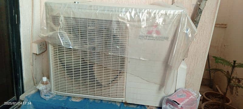 Mitsubishi Ac made in japan and universal stablizer 7000 watt 3