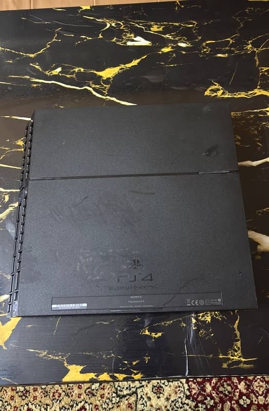 PS4(FAT),original controller and a free game (DRIVE CLUB) 9