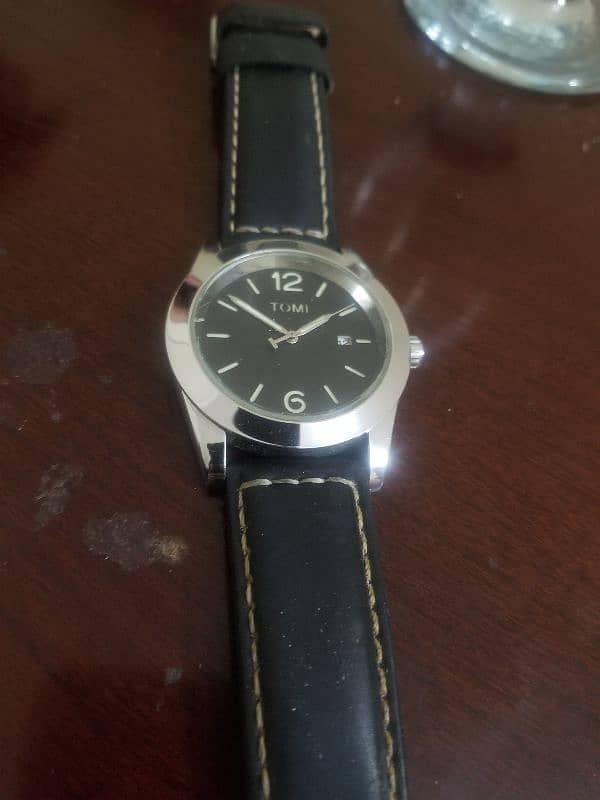 used tomi watch, luminescent dial, can see in dark. 0