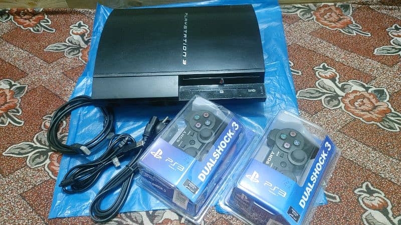 ps3/500gb/50 games installed with 2 boxe pack controllers 0