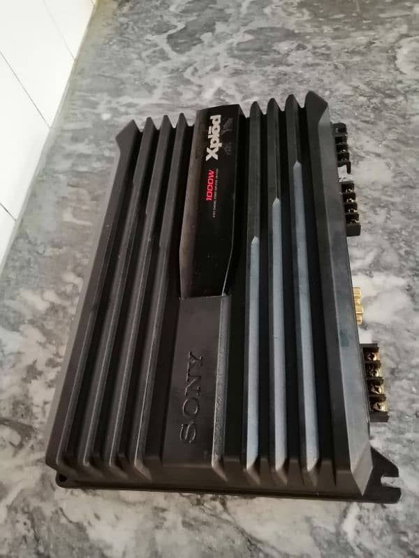 Sony xplod imported amplifier 4 channel and woofer 3