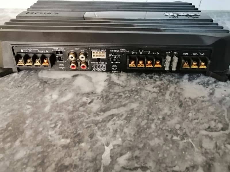 Sony xplod imported amplifier 4 channel and woofer 4