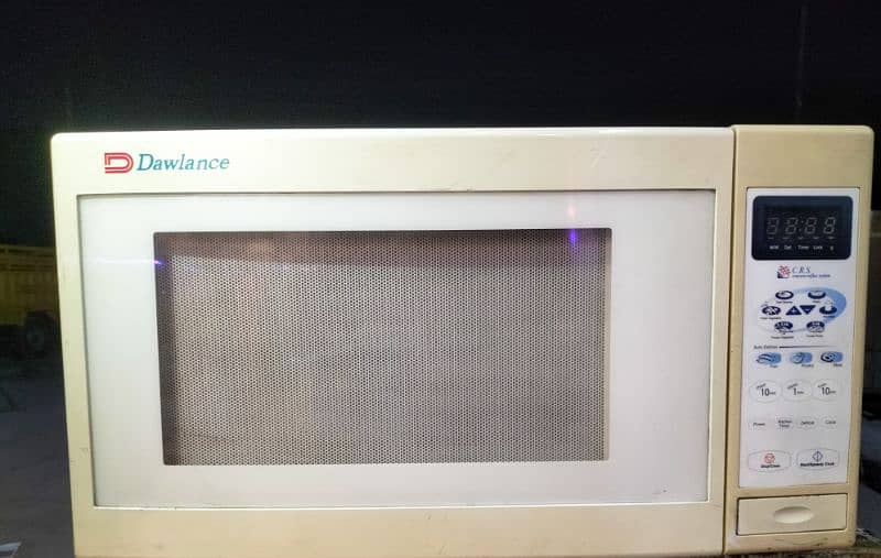 Dawlance microwave oven 100٪ working 10/10 condition 0